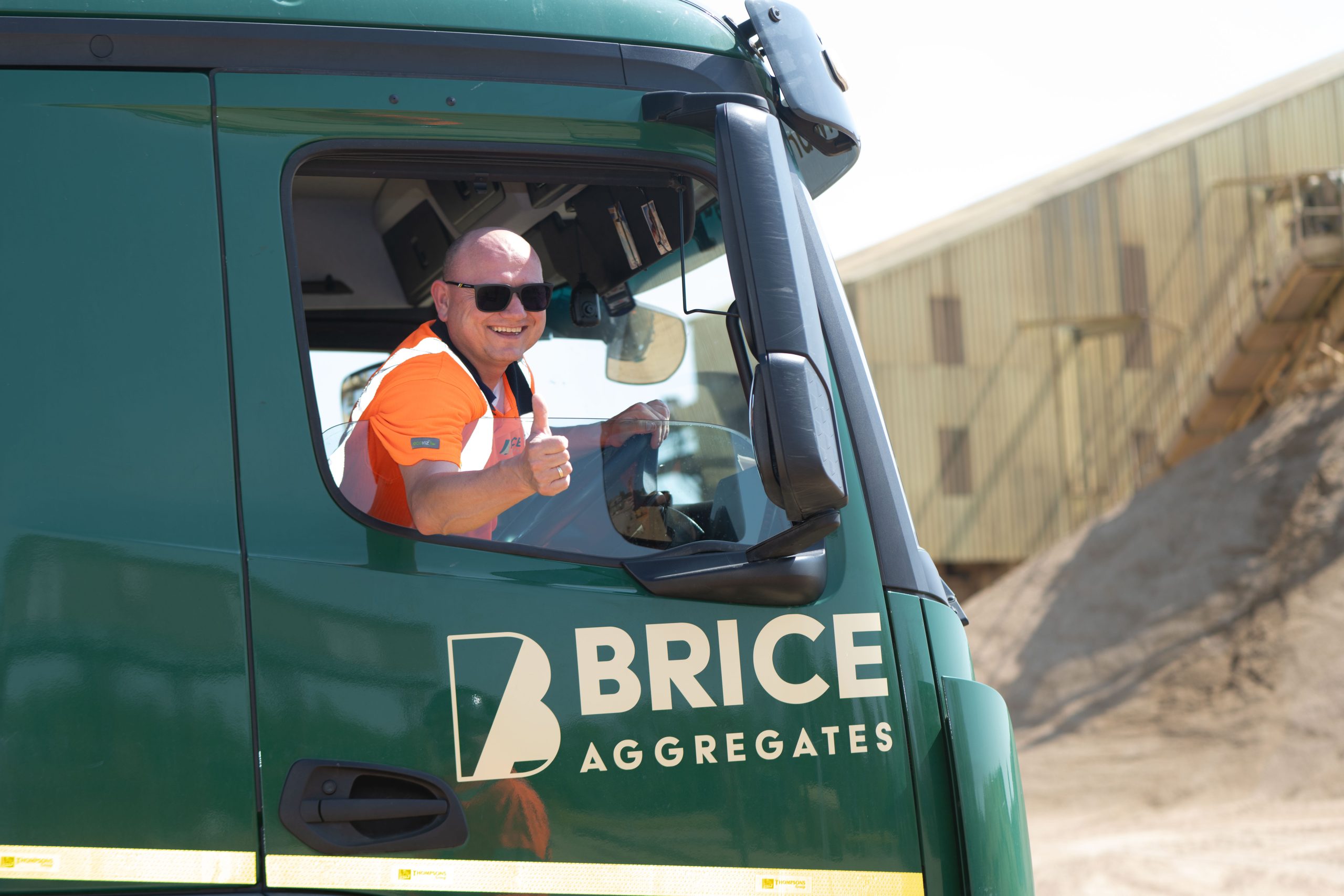 Brice Aggregates yard with mixer truck and silos